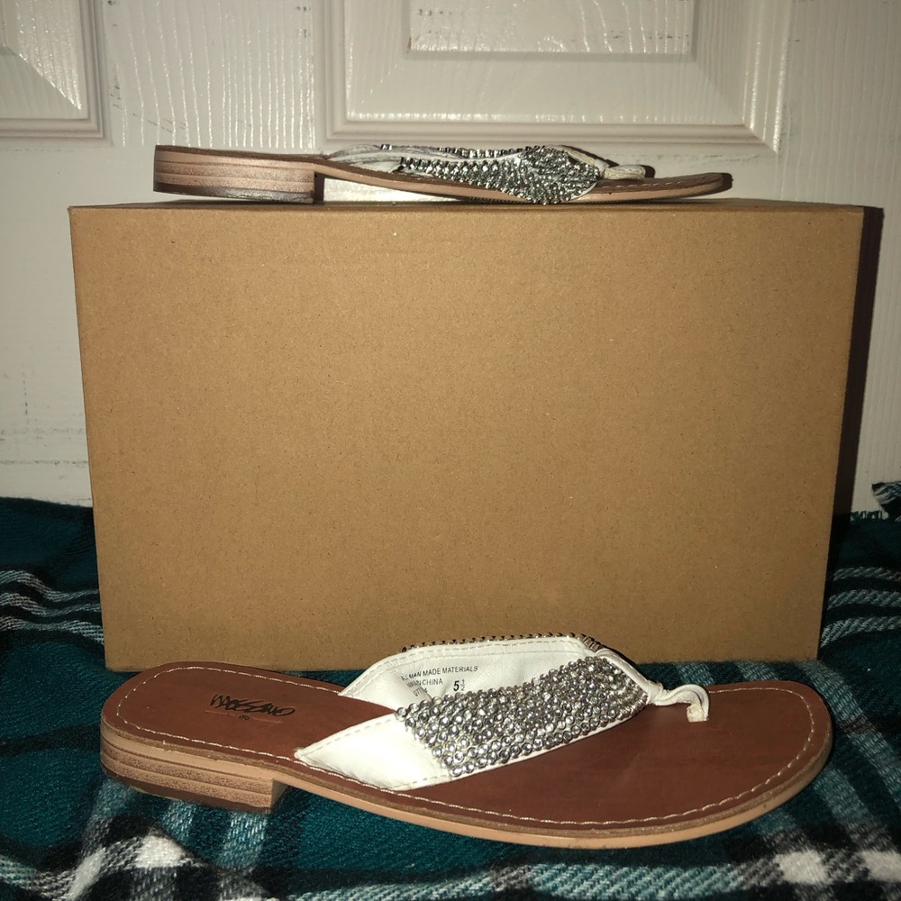 Size 5 1/2 silver bedazzled white flip flops